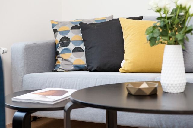 Arrange the pillows neatly and symmetrically